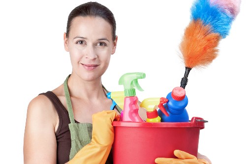 Professional after builders cleaning removing dust from a newly renovated room